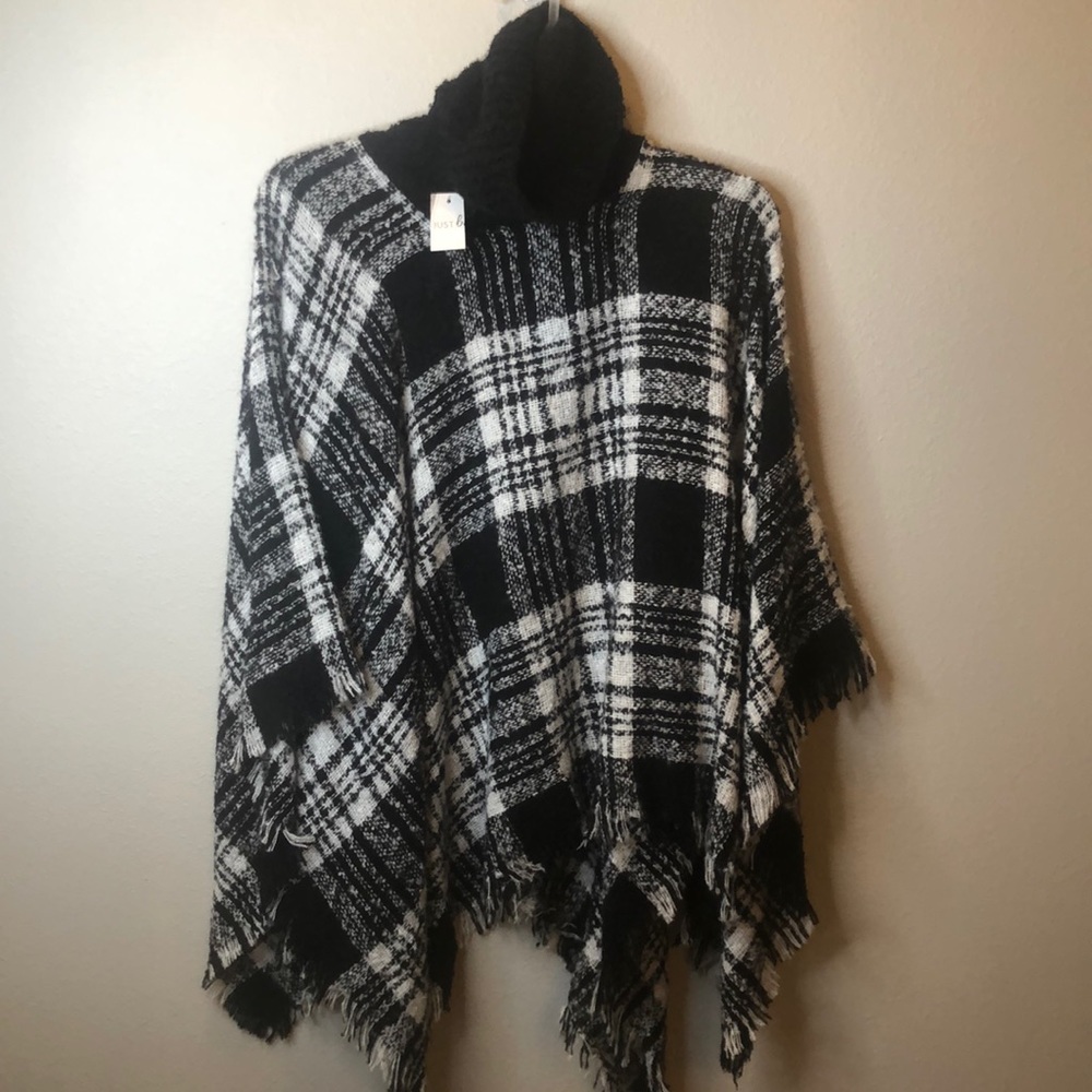 Black and white sweater turtleneck poncho